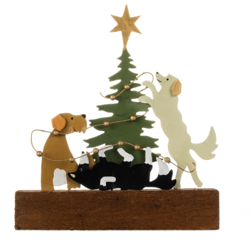 Dogs decorating the Christmas Tree